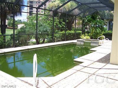 11620 Compass Point Drive Fort Myers, FL 33908 - Photo 10 of 10 a view of a swimming pool with a patio