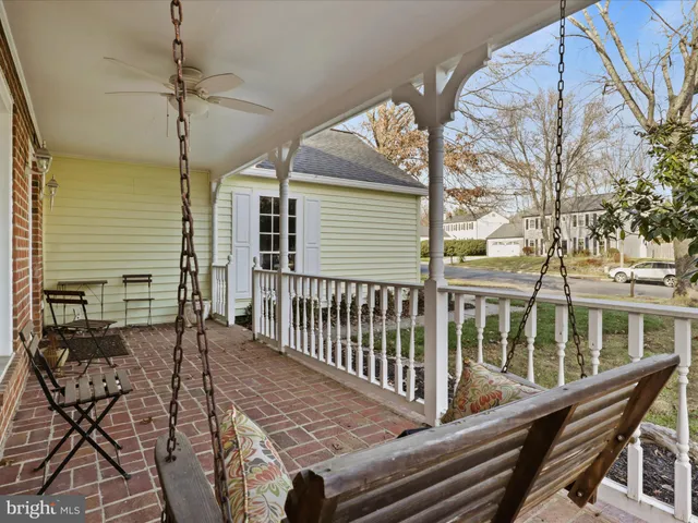 a view of a balcony with wooden floor