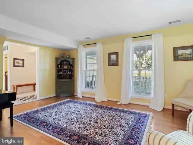 a view of livingroom with furniture and rug