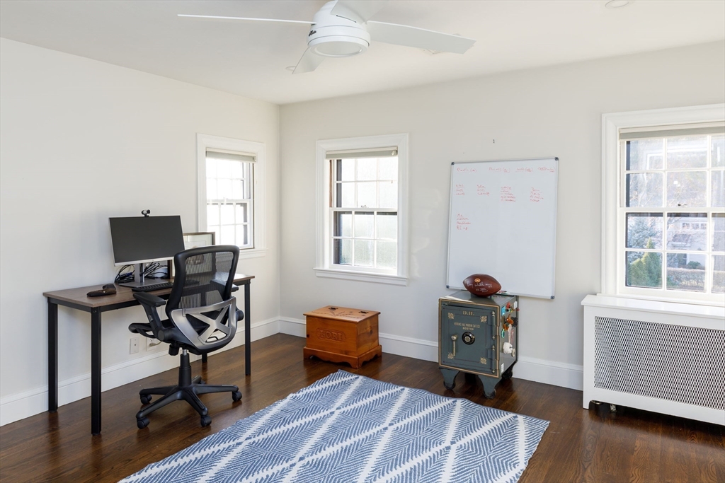 6 Risley Road Newton, MA 02465 - Photo 11 of 21 a livingroom with workspace and a window