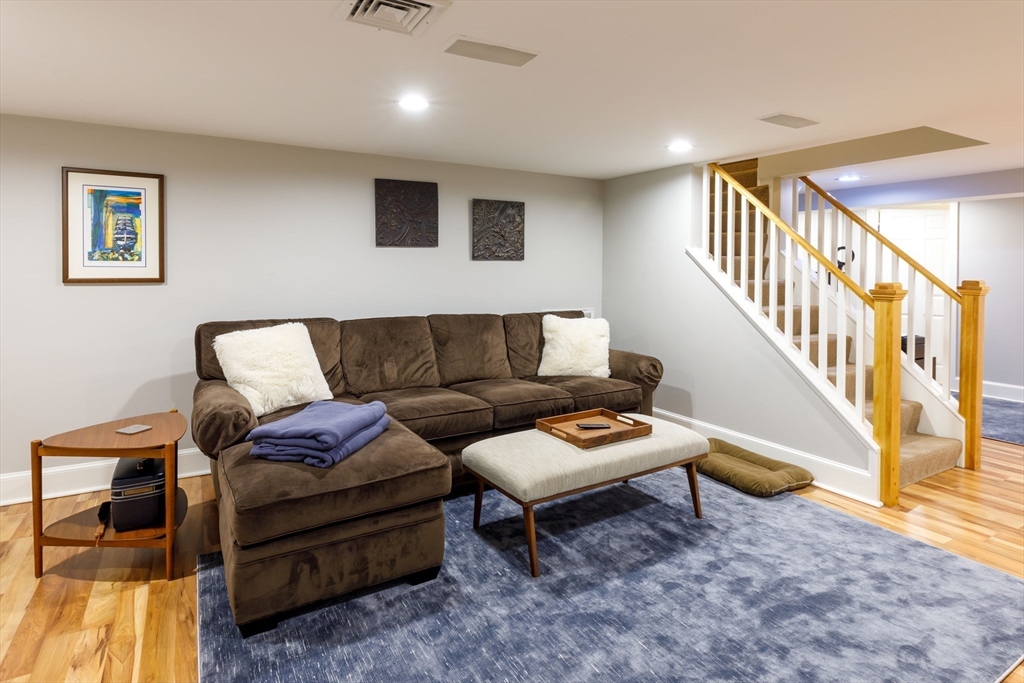 6 Risley Road Newton, MA 02465 - Photo 14 of 21 a living room with furniture and wooden floor