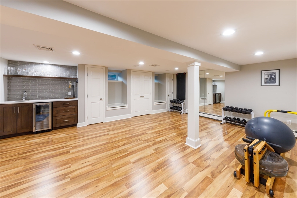 6 Risley Road Newton, MA 02465 - Photo 16 of 21 a view of a living room a room and wooden floor