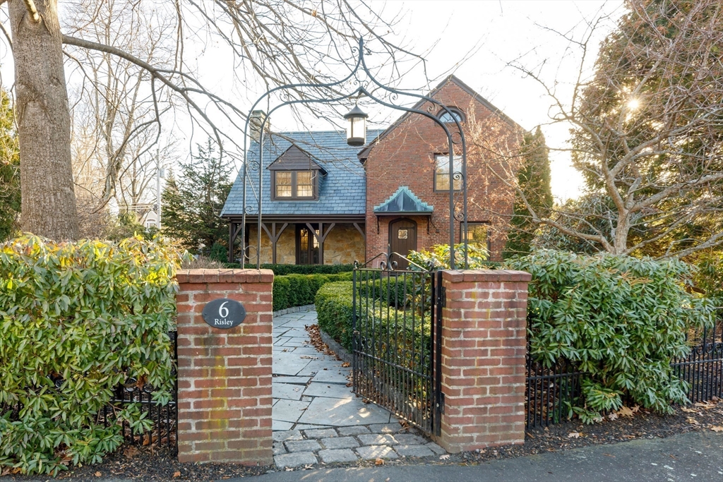 6 Risley Road Newton, MA 02465 - Photo 17 of 21 a front view of a house with a yard and tree s