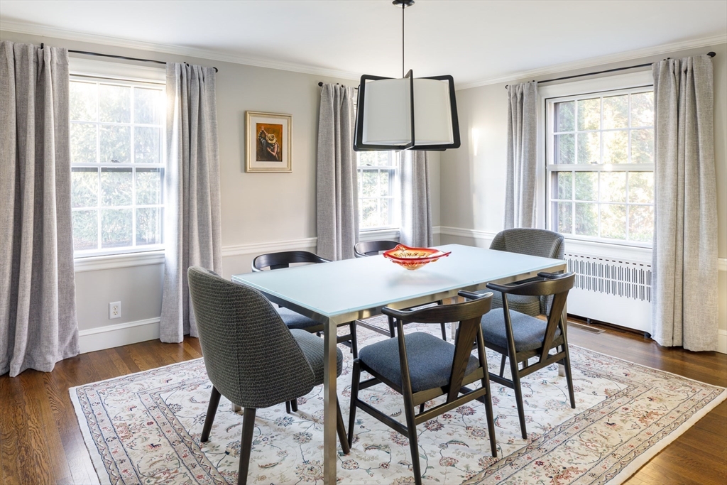 6 Risley Road Newton, MA 02465 - Photo 5 of 21 a view of a dining room with furniture window and wooden floor