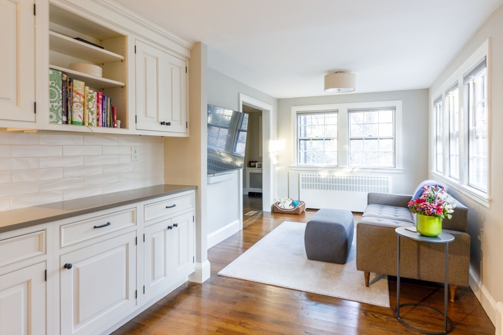 6 Risley Road Newton, MA 02465 - Photo 6 of 21 a living room with furniture and a window