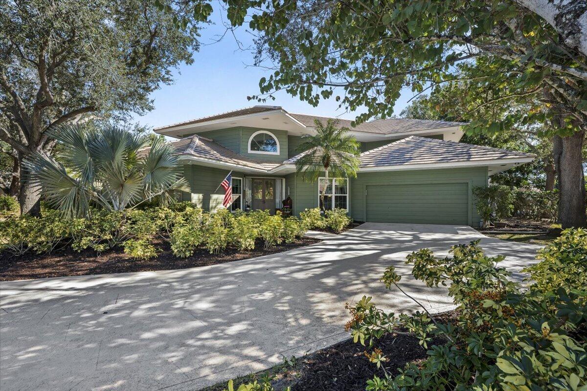 7 Alnwick Road Palm Beach Gardens, FL 33418 - Photo 1 of 47 front view of a house with a yard