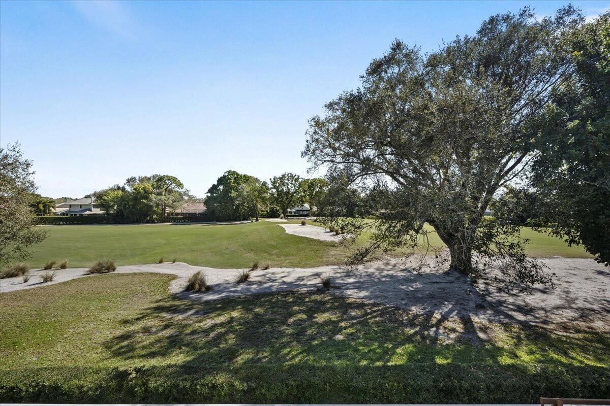 7 Alnwick Road Palm Beach Gardens, FL 33418 - Photo 34 of 47 a view of lake with green space