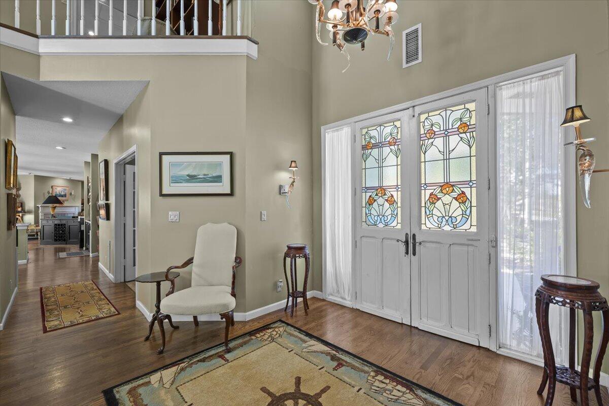 7 Alnwick Road Palm Beach Gardens, FL 33418 - Photo 4 of 47 a view of a livingroom with furniture and a window