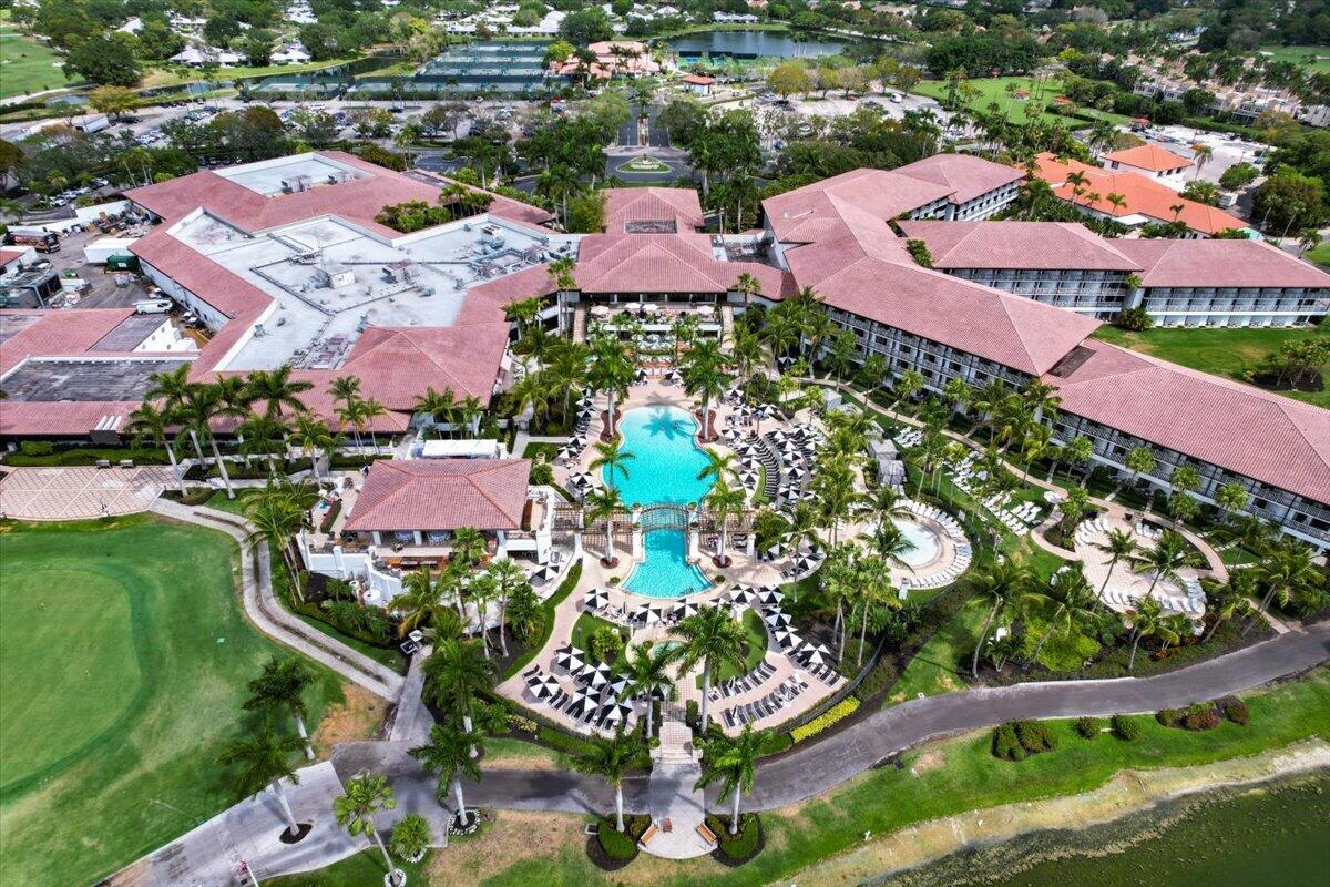 7 Alnwick Road Palm Beach Gardens, FL 33418 - Photo 41 of 47 an aerial view of an outdoor space with swimming pool and outdoor seating