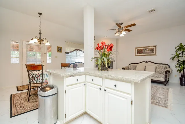 a view of a kitchen and living room