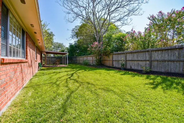 a view of a backyard with a garden