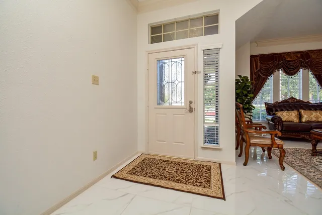 a view of livingroom with furniture and windows
