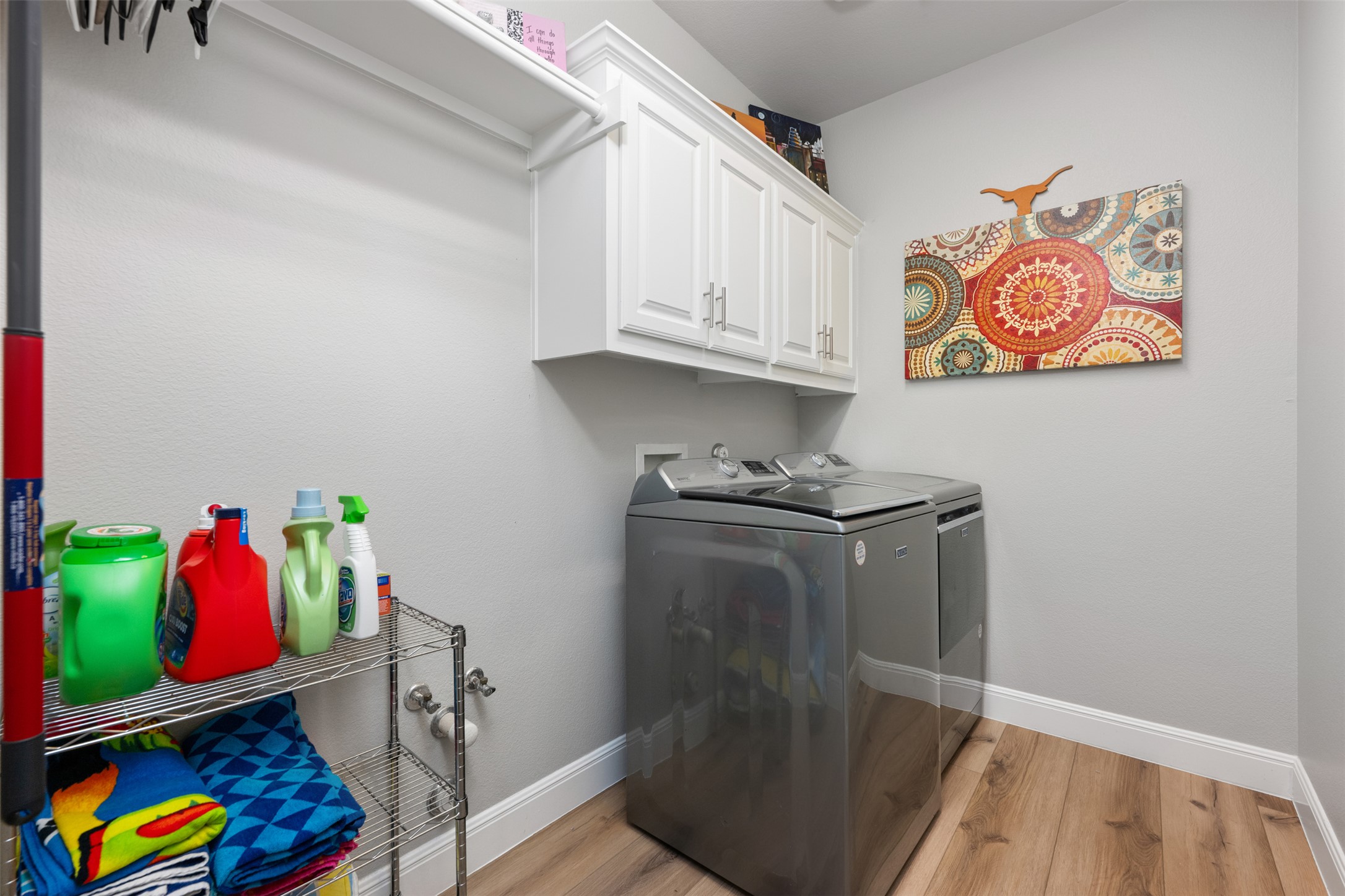 3021 Wedgescale Pass Leander, TX 78641 - Photo 16 of 40 a utility room with dryer and washer