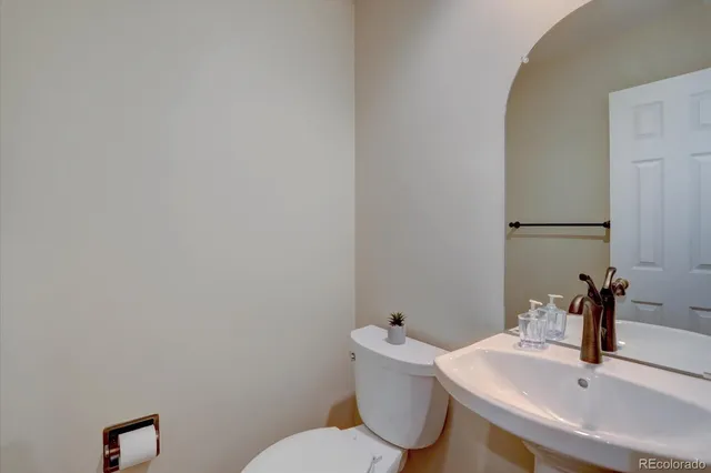 a bathroom with a sink and a toilet