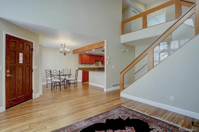 a view of dining room with furniture and wooden floor