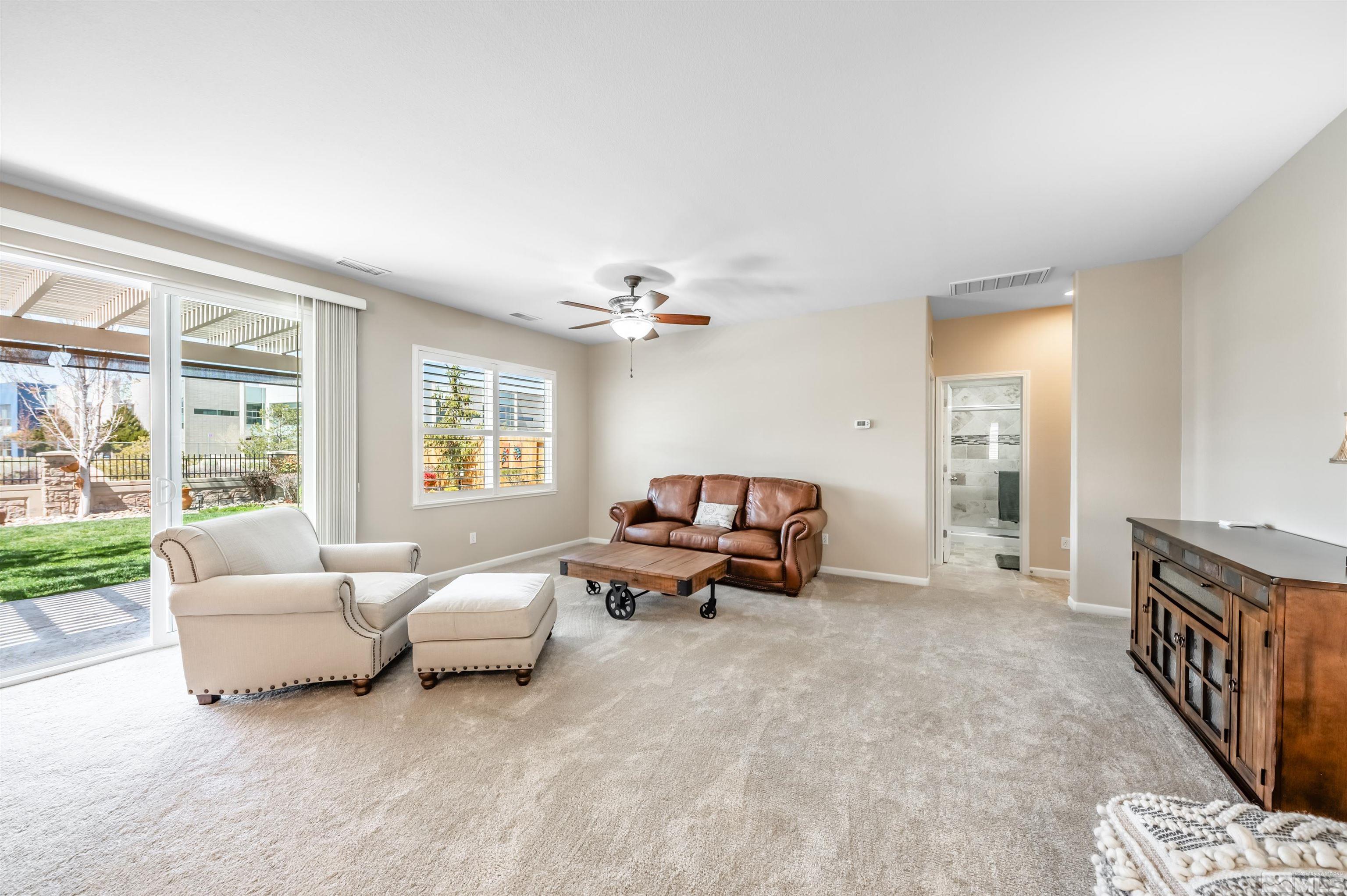 9375 Spotted Horse Road Reno, NV 89521 - Photo 15 of 33 a living room with furniture and a large window