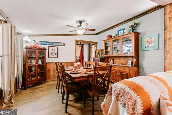 a view of a dining room with furniture