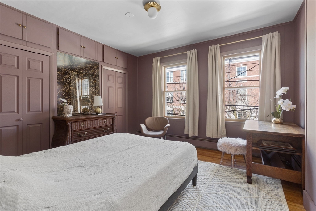 56 Spring Street, Unit 56 Cambridge, MA 02141 - Photo 8 of 15 a bedroom with a bed and a window