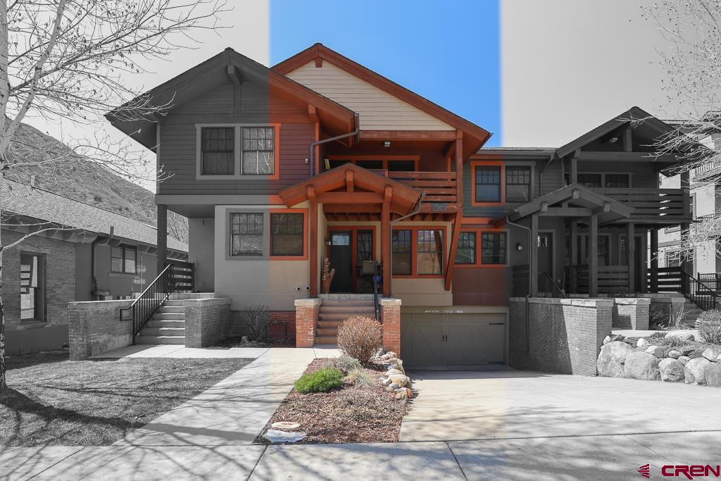 a front view of a house with yard