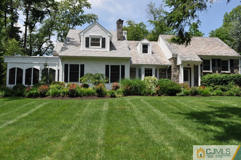 110 Stafford Road Colonia, NJ 07067 - Photo 1 of 24 a front view of a house with a yard