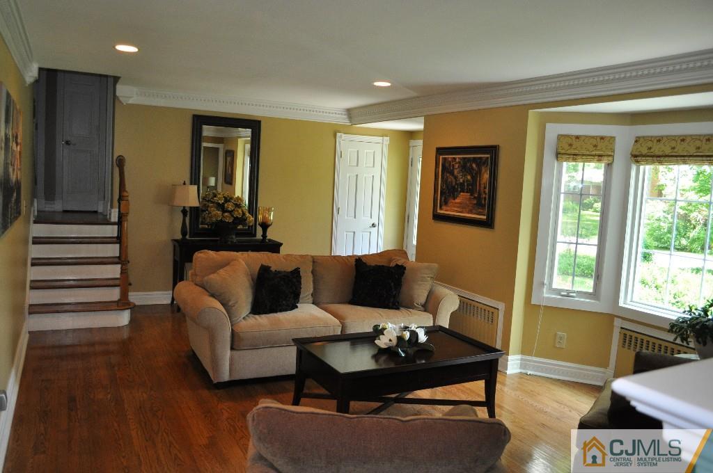110 Stafford Road Colonia, NJ 07067 - Photo 11 of 24 a living room with furniture and a potted plant
