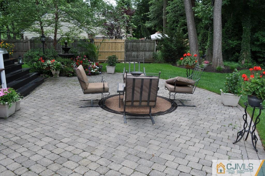 110 Stafford Road Colonia, NJ 07067 - Photo 18 of 24 a view of a backyard with plants and a garden