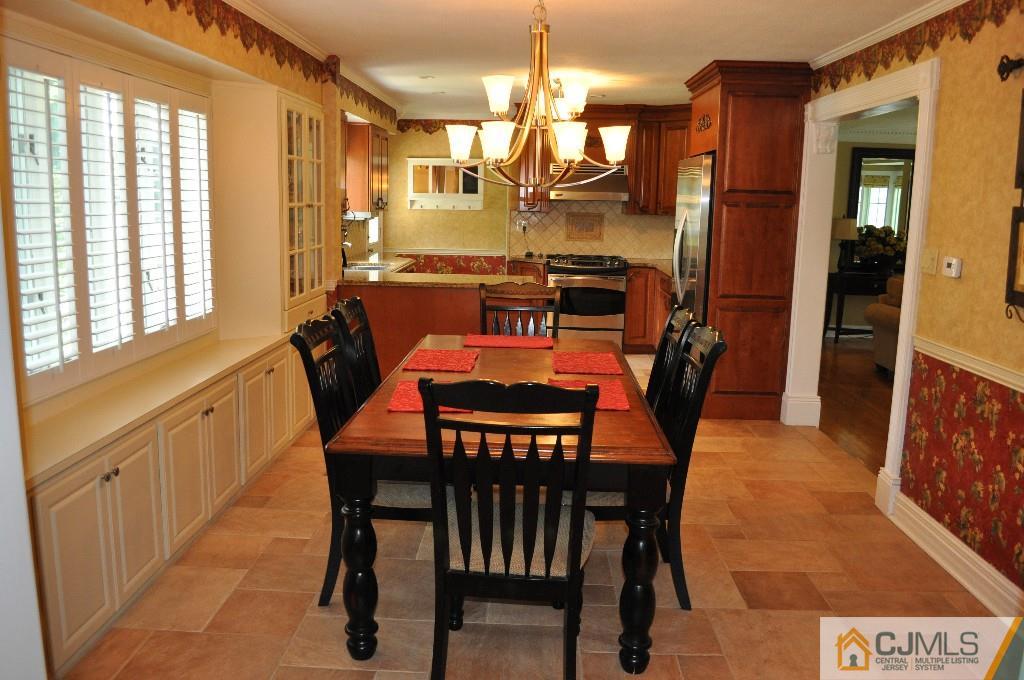 110 Stafford Road Colonia, NJ 07067 - Photo 20 of 24 a dining room with furniture and window