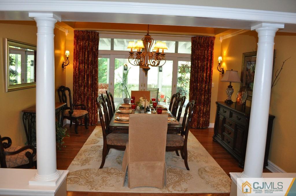 110 Stafford Road Colonia, NJ 07067 - Photo 3 of 24 a view of a dining room with furniture window and wooden floor