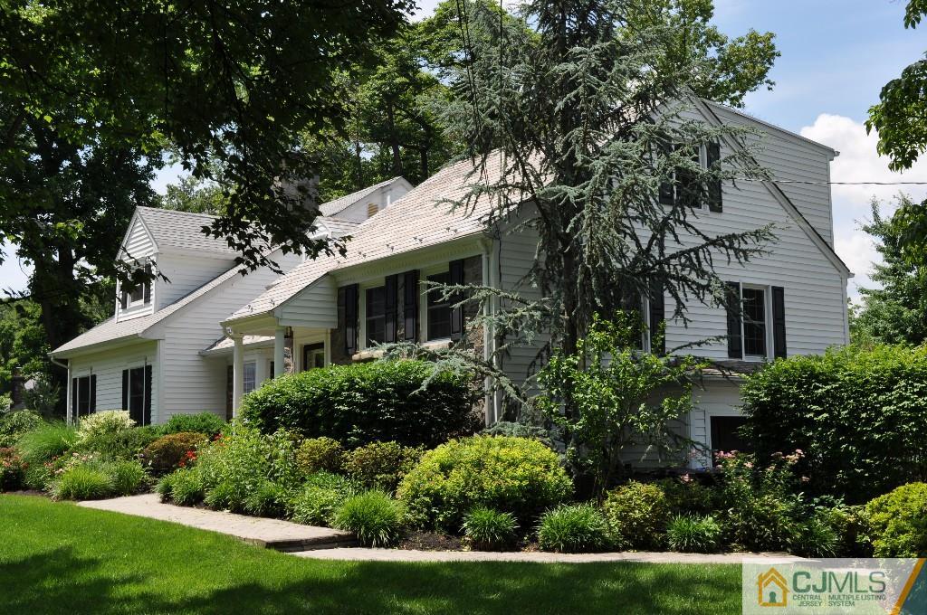 110 Stafford Road Colonia, NJ 07067 - Photo 23 of 24 a front view of a house with a yard