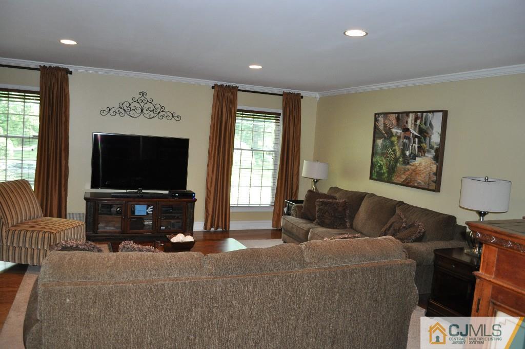 110 Stafford Road Colonia, NJ 07067 - Photo 10 of 24 a living room with furniture and a flat screen tv