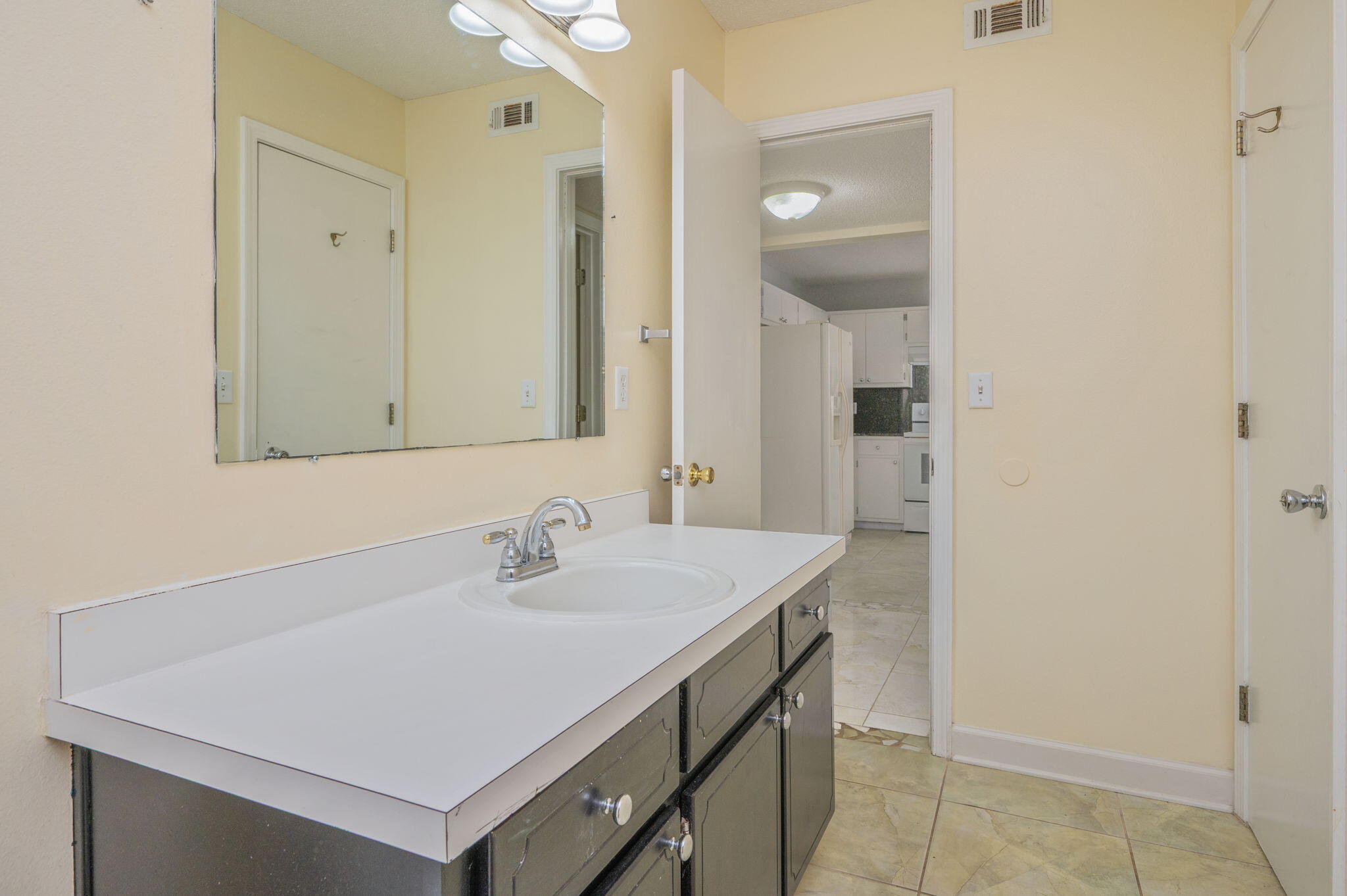 130 Scranton Street Fort Walton Beach, FL 32547 - Photo 21 of 47 a bathroom with a sink vanity and a mirror