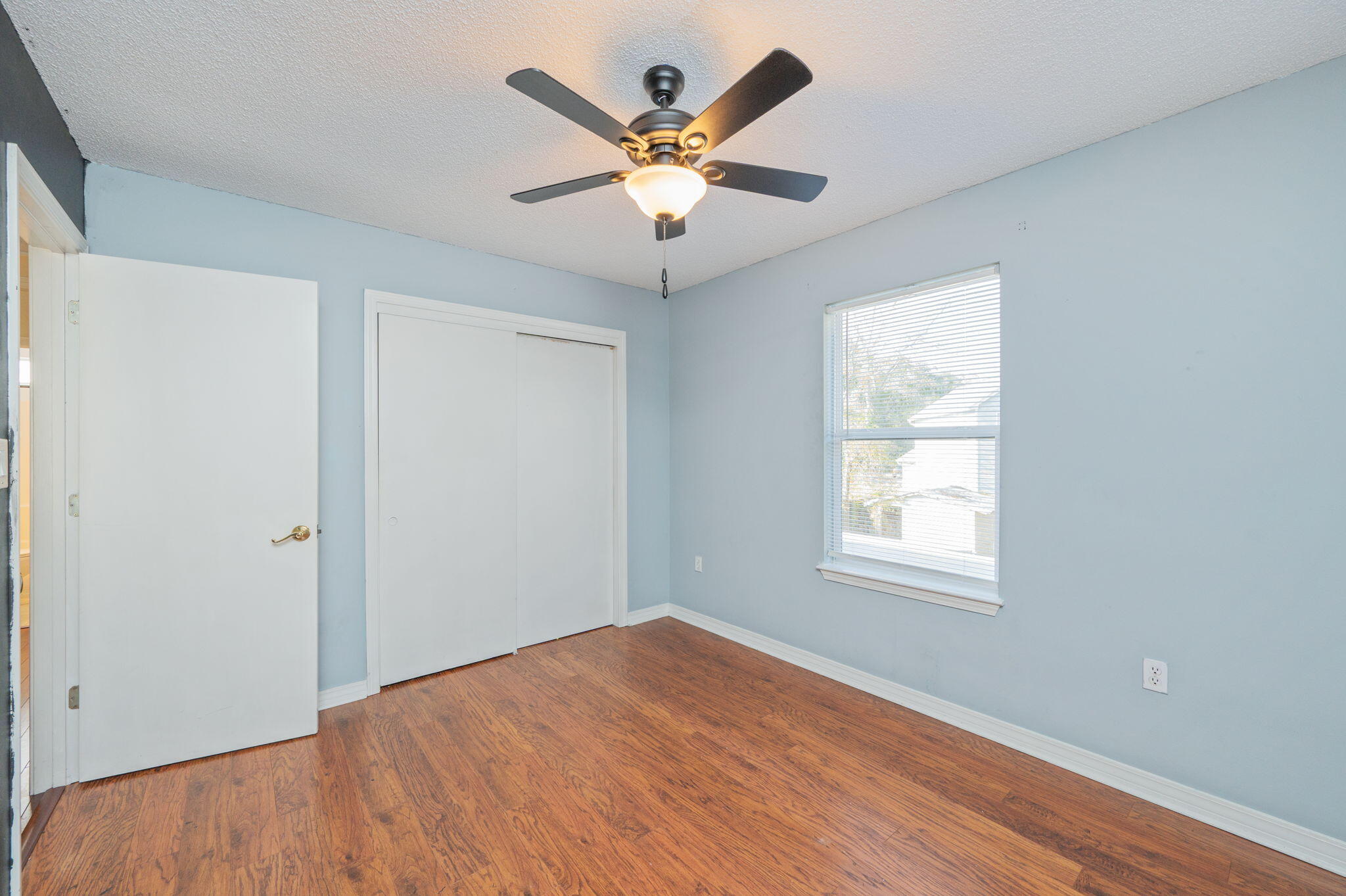 130 Scranton Street Fort Walton Beach, FL 32547 - Photo 29 of 47 a view of an empty room with window and ceiling fan