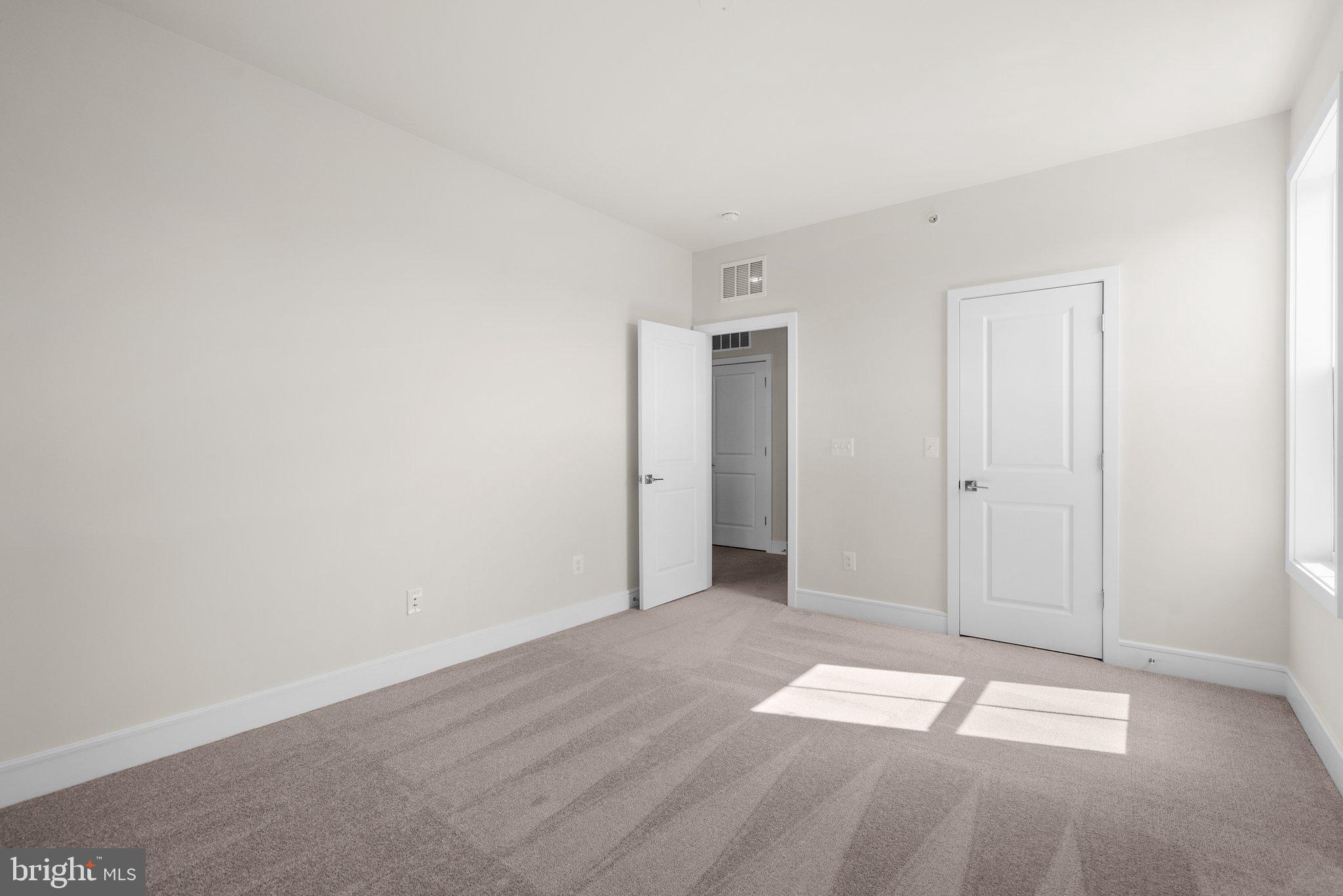 43176 Farringdon Square Broadlands, VA 20148 - Photo 17 of 33 a view of empty room with wooden floor