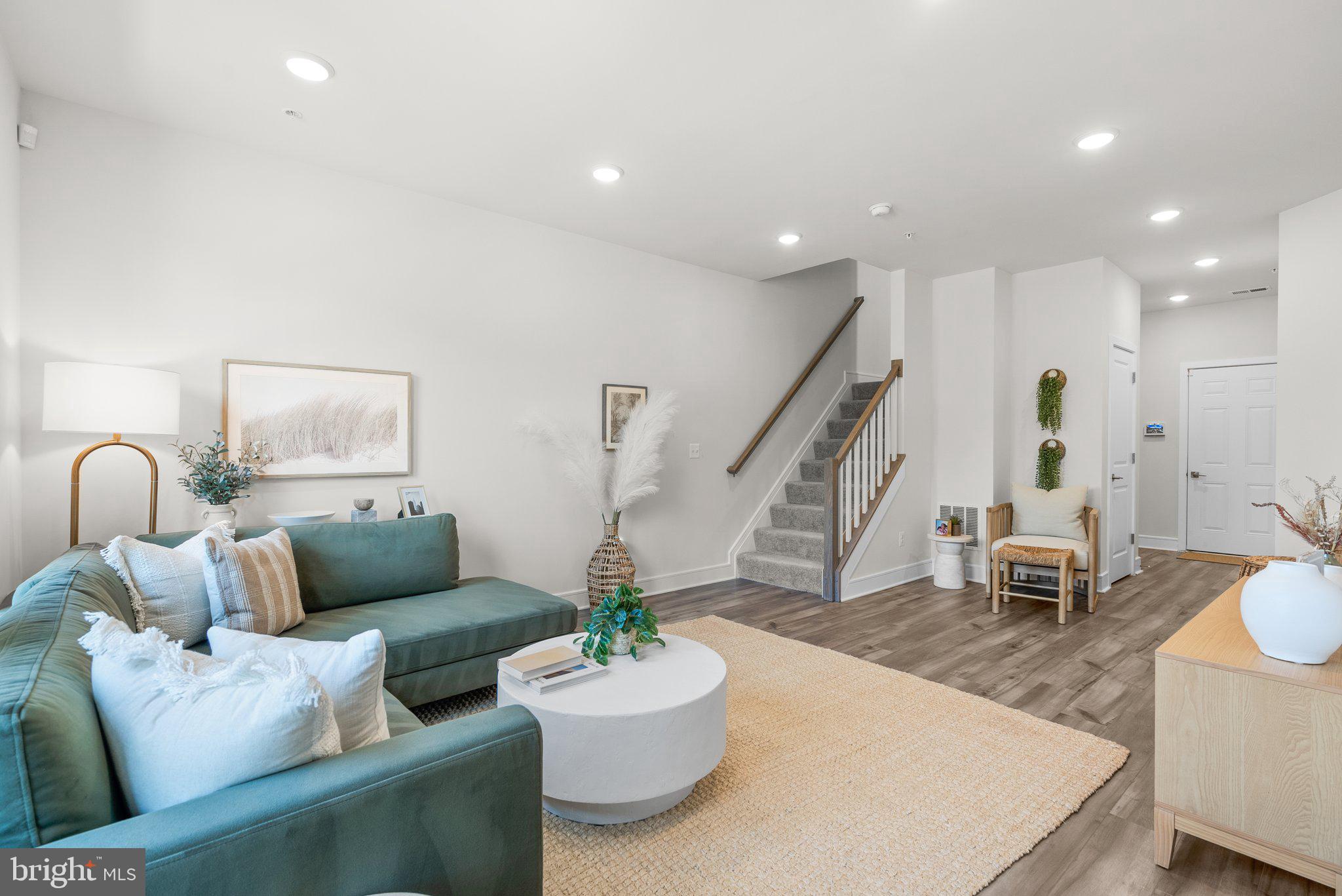 43176 Farringdon Square Broadlands, VA 20148 - Photo 21 of 33 a living room with furniture and wooden floor
