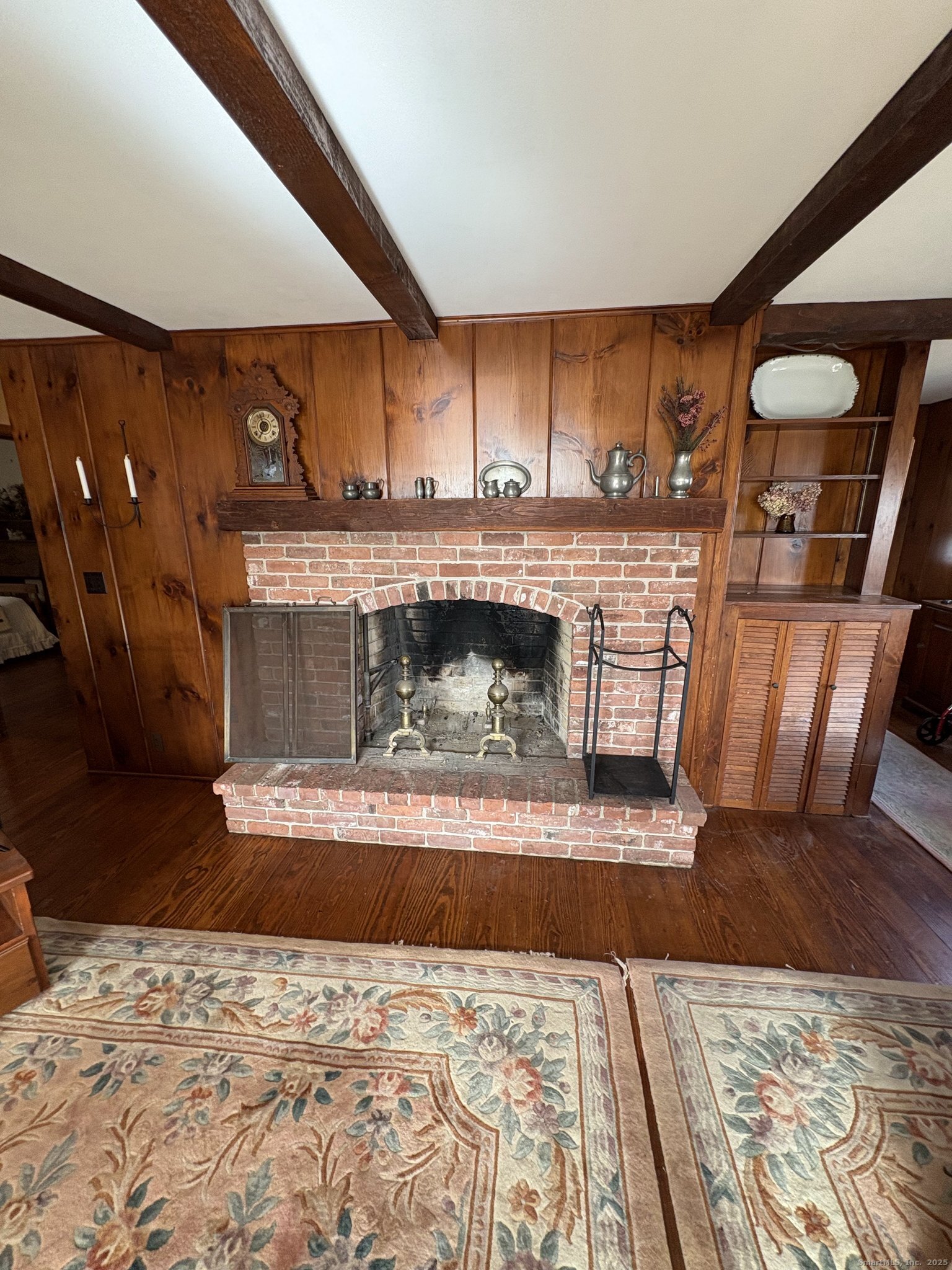 21 Fenwick Street Old Saybrook, CT 06475 - Photo 10 of 15 a view of living room with furniture and a fireplace