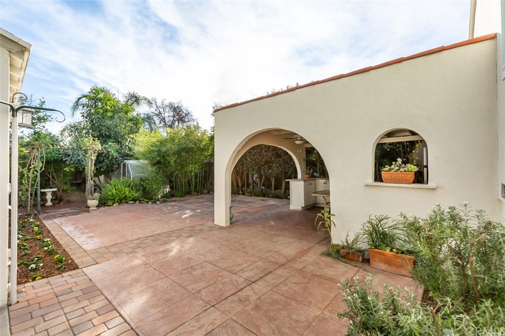 610 Del Monte Street Pasadena, CA 91103 - Photo 34 of 49 a view of a grey house with large windows
