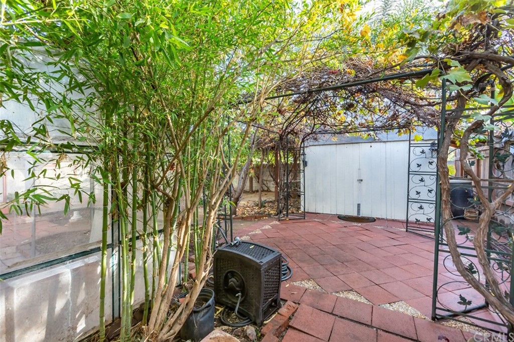 610 Del Monte Street Pasadena, CA 91103 - Photo 44 of 49 Back Yard and Grapevine Arbor