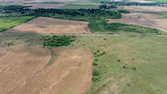 a view of a garden from a balcony