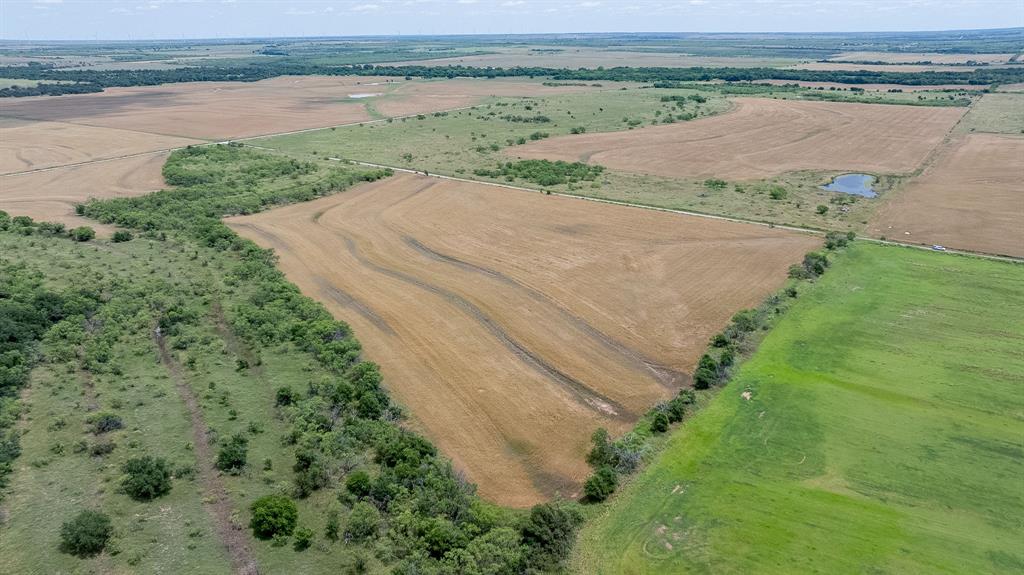 5 Taack Road Olney, TX 76374 - Photo 8 of 23 an aerial view of a house with a yard and lake view