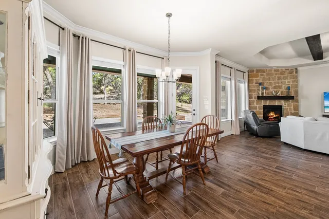 a dining room with furniture window wooden floor