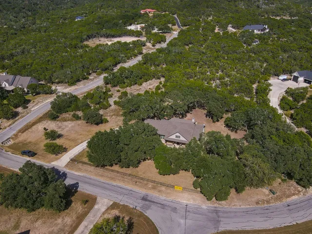 an aerial view of residential house with outdoor space