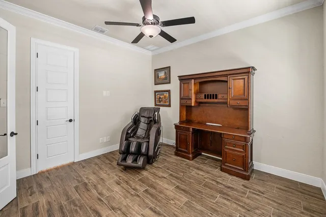 a view of room with window and furniture