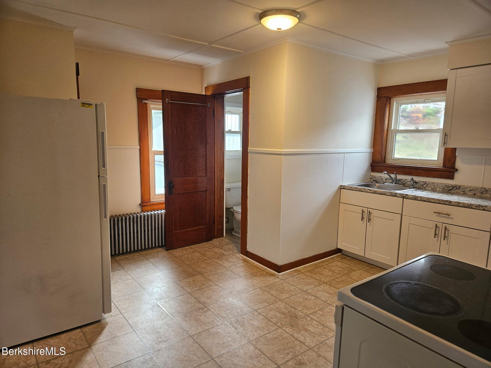 1 Edward Avenue Adams, MA 01220 - Photo 5 of 9 a kitchen with a stove and a refrigerator