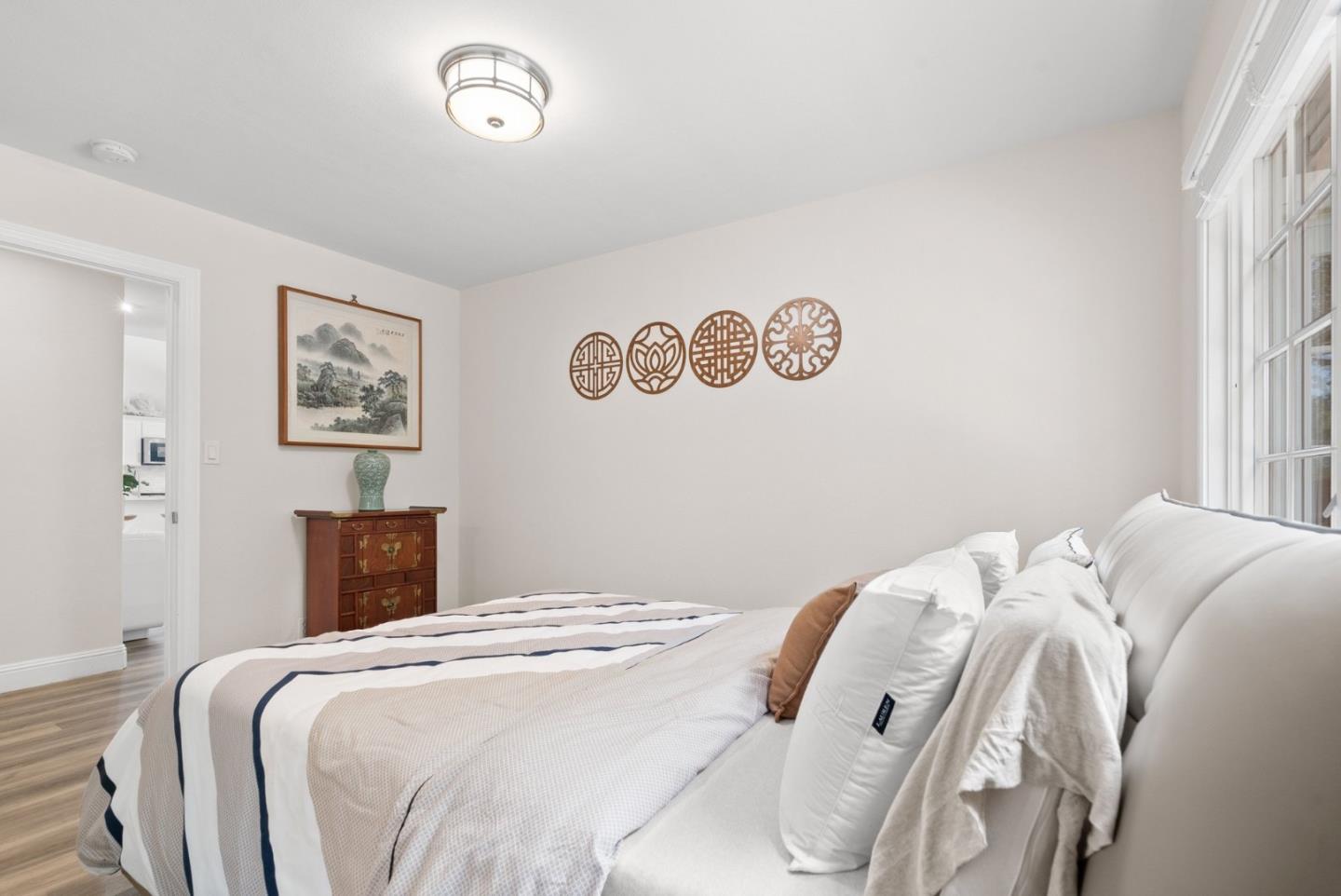 770 Graham Hill Road Santa Cruz, CA 95060 - Photo 52 of 83 a bedroom with a bed and a window