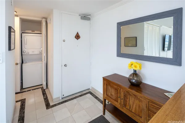 a bathroom with a sink a mirror and shower