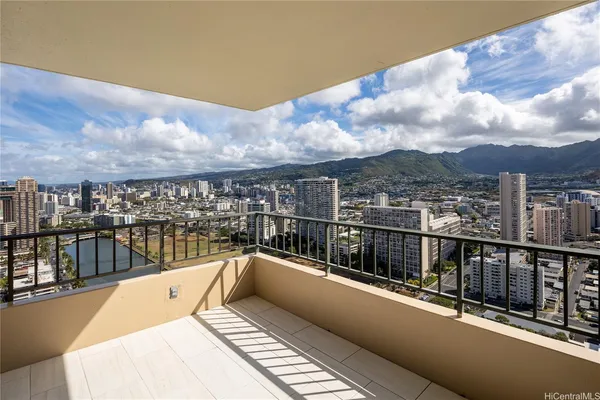 a view of a balcony with city view