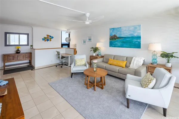 a living room with furniture and a couch