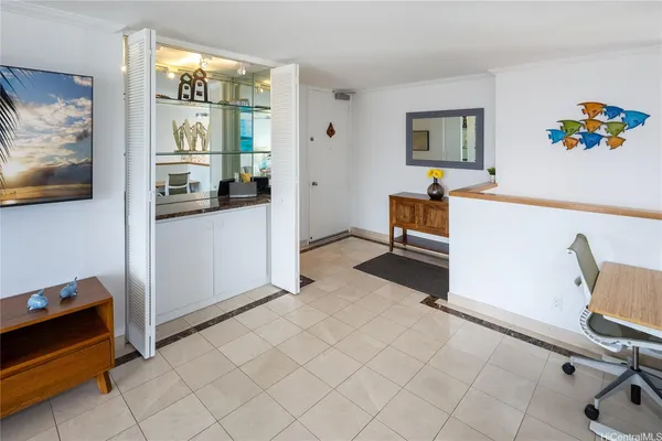 a living room with furniture and a table