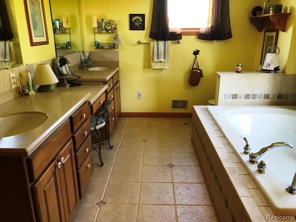 3335 North Cedar Road Fowlerville, MI 48836 - Photo 10 of 27 3335 Cedar - master bath (2).jpg