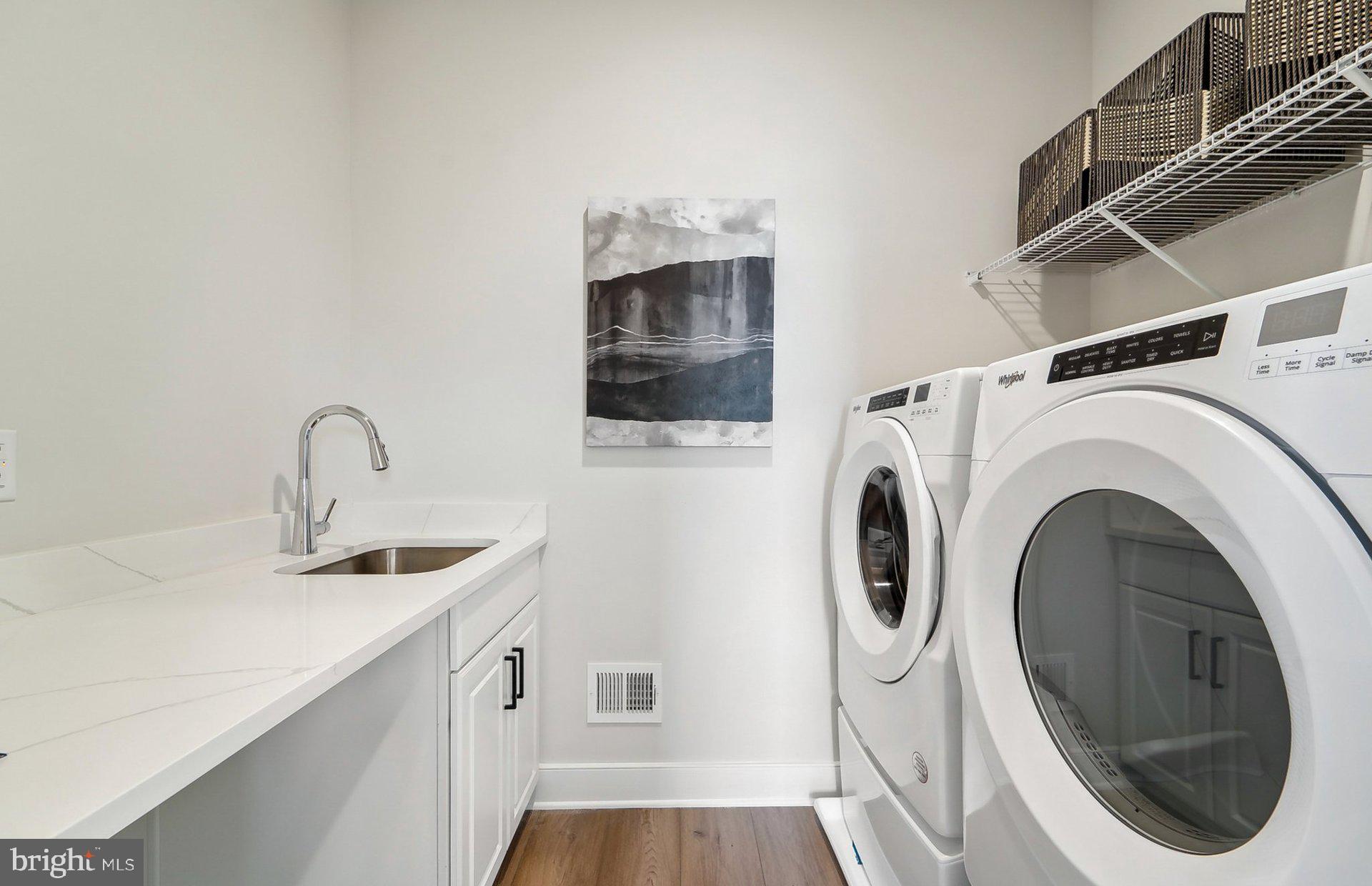 22512 Sculpin Brk Road Boyds, MD 20841 - Photo 35 of 69 a utility room with sink dryer and washer